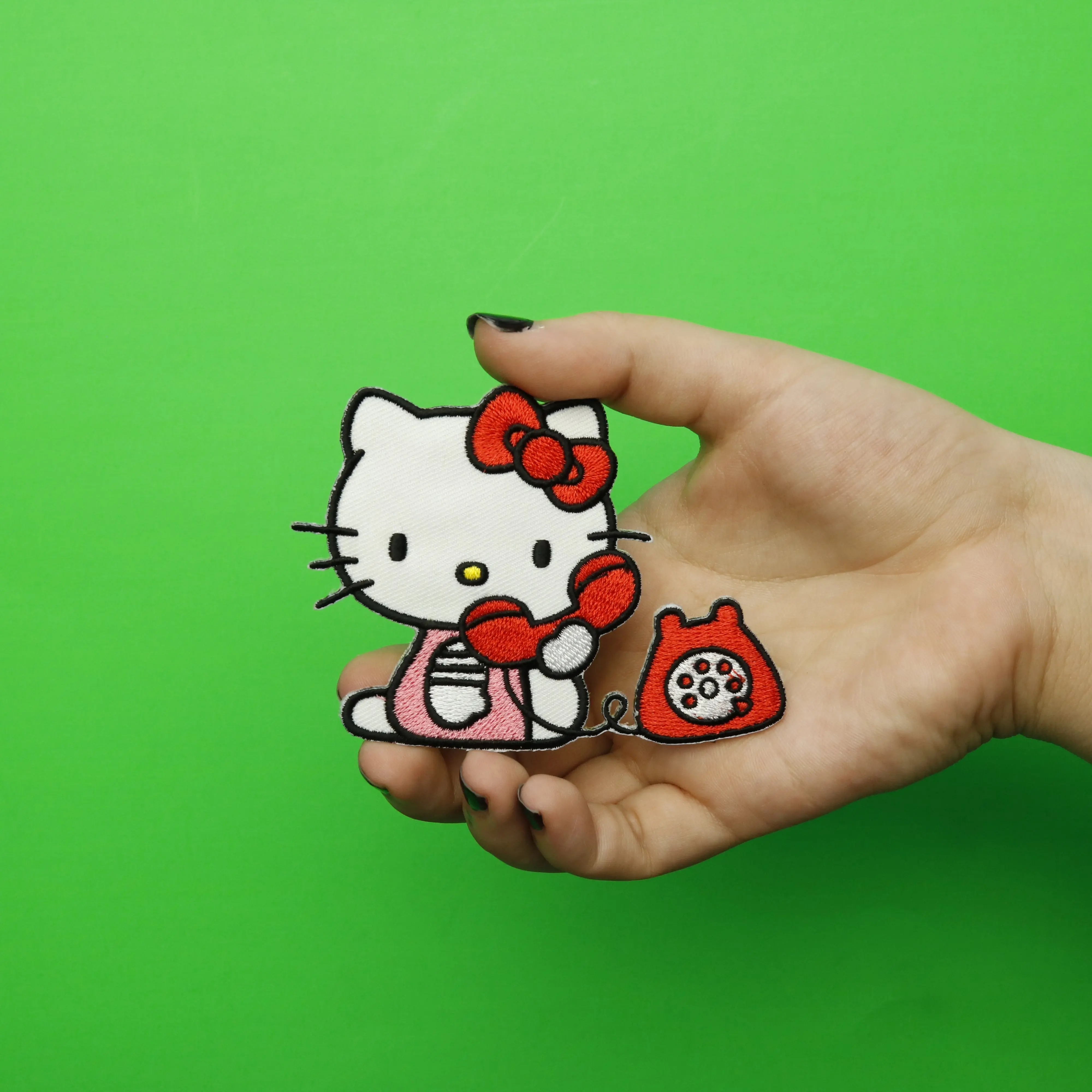 Hello Kitty on Red Telephone Iron On Embroidered Patch - Image 2