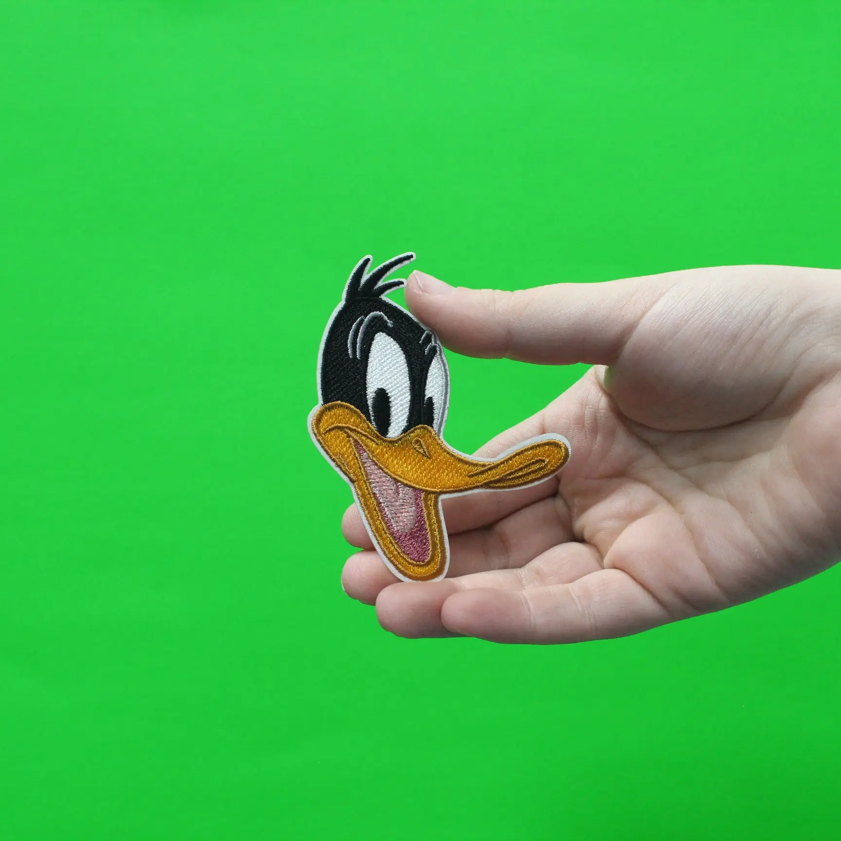 Official Daffy Duck Smiling Head Embroidered Iron On Patch - Image 2