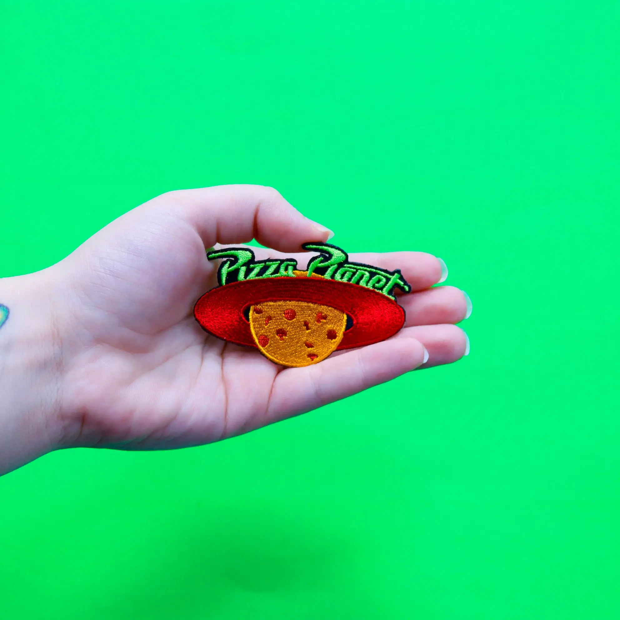 Official Toy Story: Pizza Planet Logo Embroidered Iron On Patch - Image 3