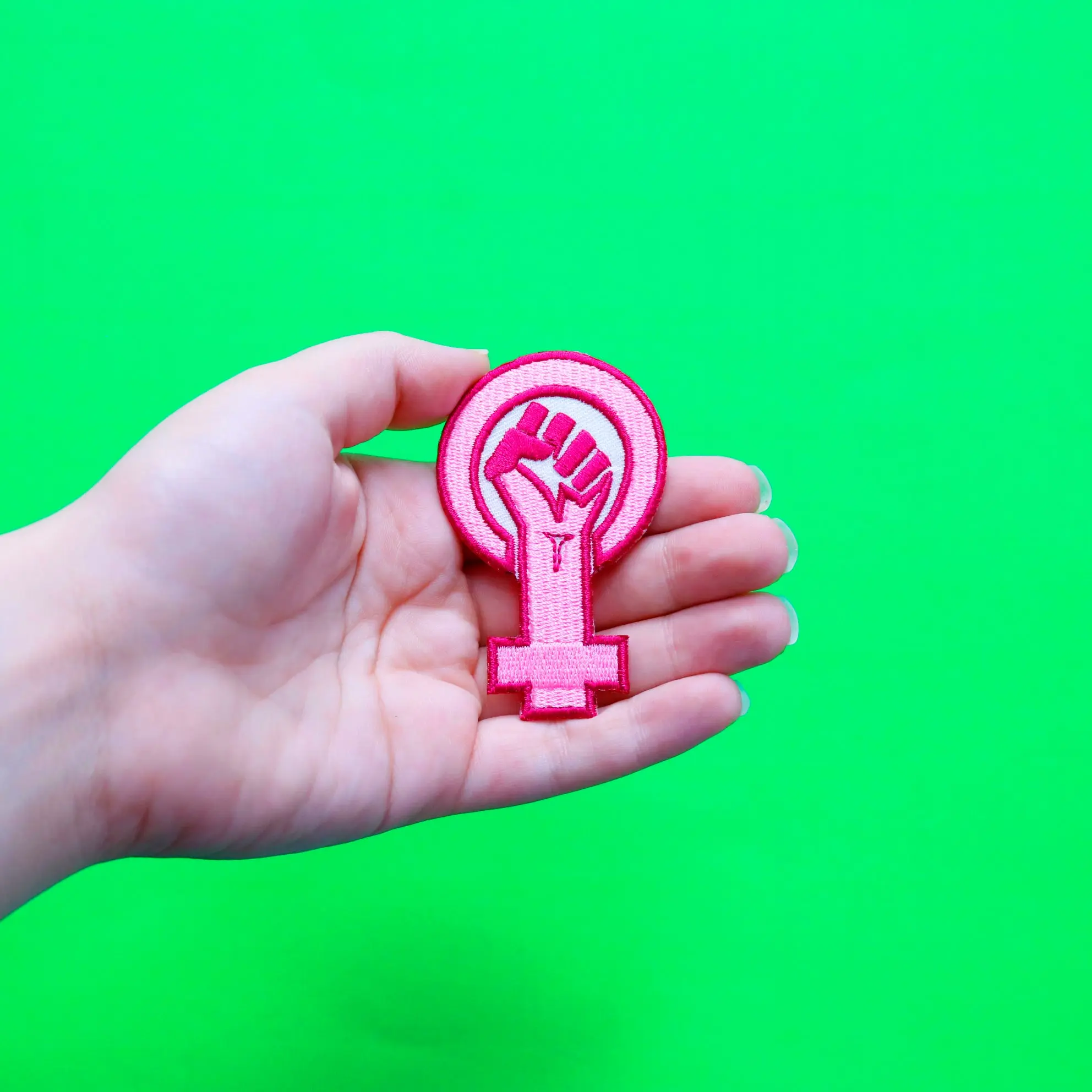 Pink Feminist Fist Logo Embroidered Iron On Patch - Image 2