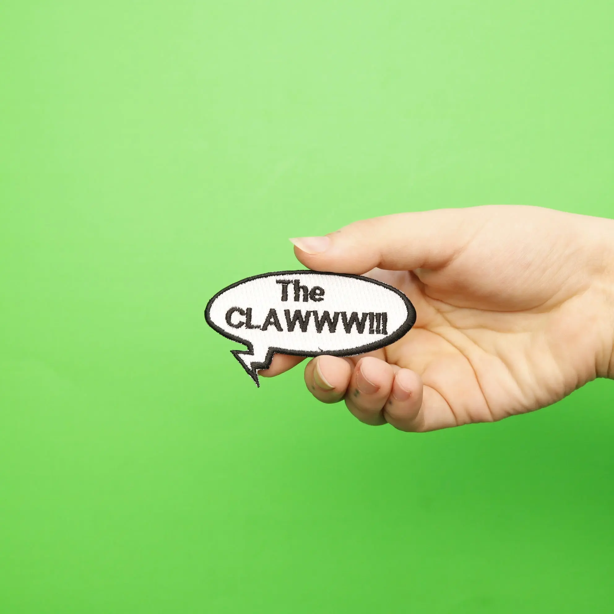 "THE CLAWWW!!!" Word Bubble Embroidered Iron On Patch - Image 2